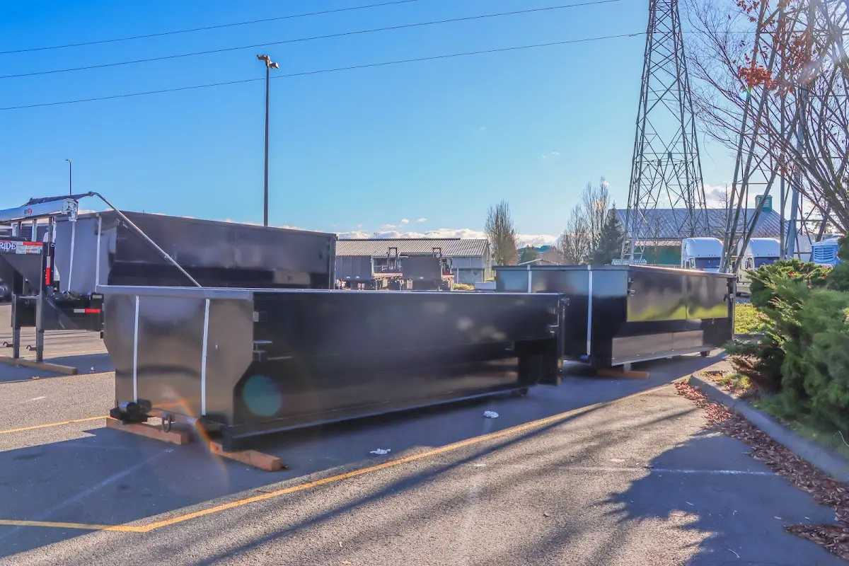 Roll-off dumpster ready for waste disposal at job site for 12 Yard Dumpster Rental in Barnesville